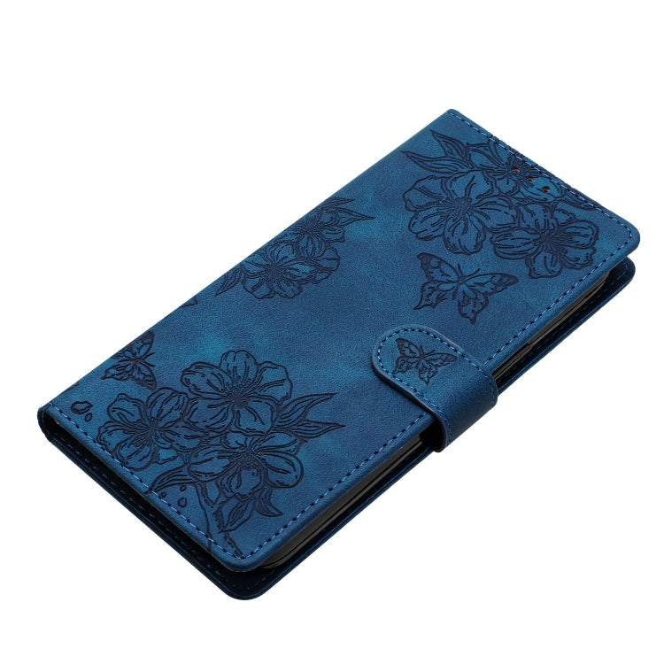 For iPhone 16 Cherry Blossom Butterfly Skin Feel Embossed PU Phone Case(Blue) - iPhone 16 Cases by PMC Jewellery | Online Shopping South Africa | PMC Jewellery | Buy Now Pay Later Mobicred