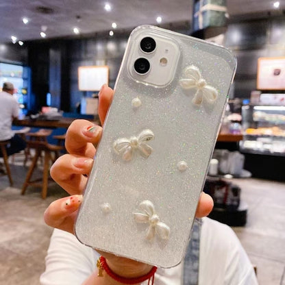 For iPhone 16 Pearl Bow Glitter Epoxy TPU Phone Case(Cross Knots) - iPhone 16 Cases by PMC Jewellery | Online Shopping South Africa | PMC Jewellery | Buy Now Pay Later Mobicred