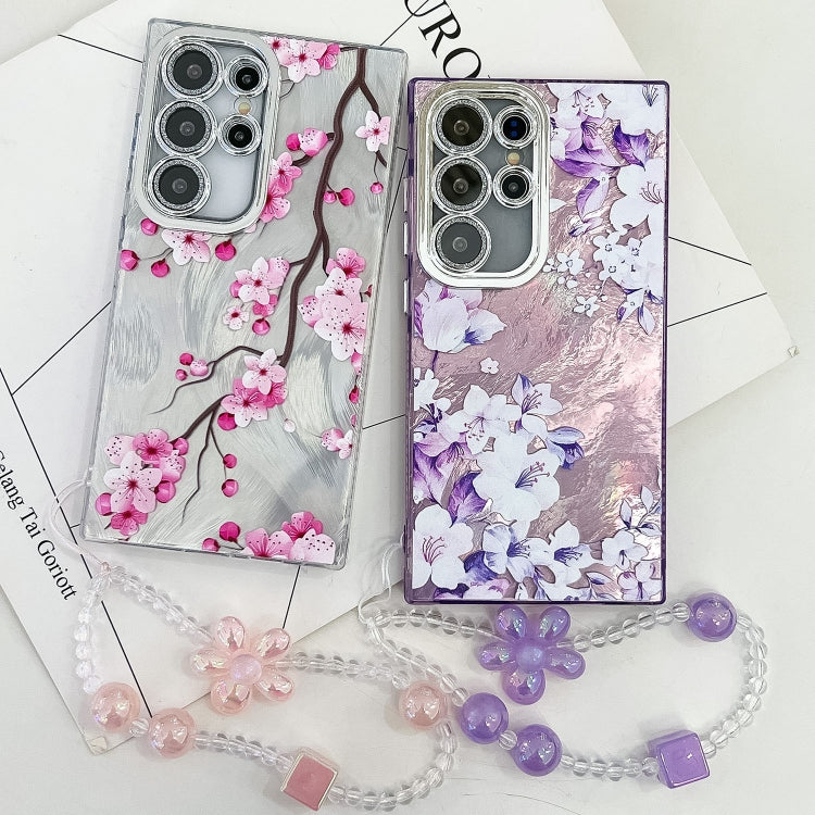 For Samsung Galaxy S25+ 5G Electroplating Flowers Plants Texture Wristband TPU Phone Case(Pale Purple FlowerFL11) - Galaxy S25+ 5G Cases by PMC Jewellery | Online Shopping South Africa | PMC Jewellery | Buy Now Pay Later Mobicred